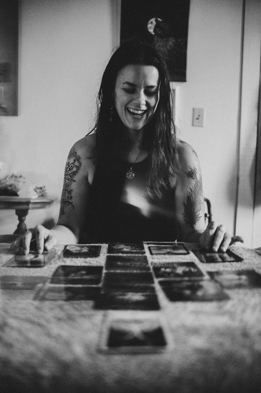 Laying out a card spread at the table