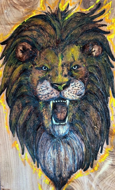 Lion wood burning on cedar